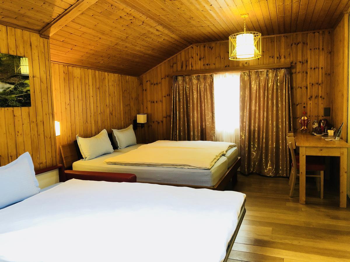 Qi-Lin Hotel Restaurant Ayer Екстериор снимка