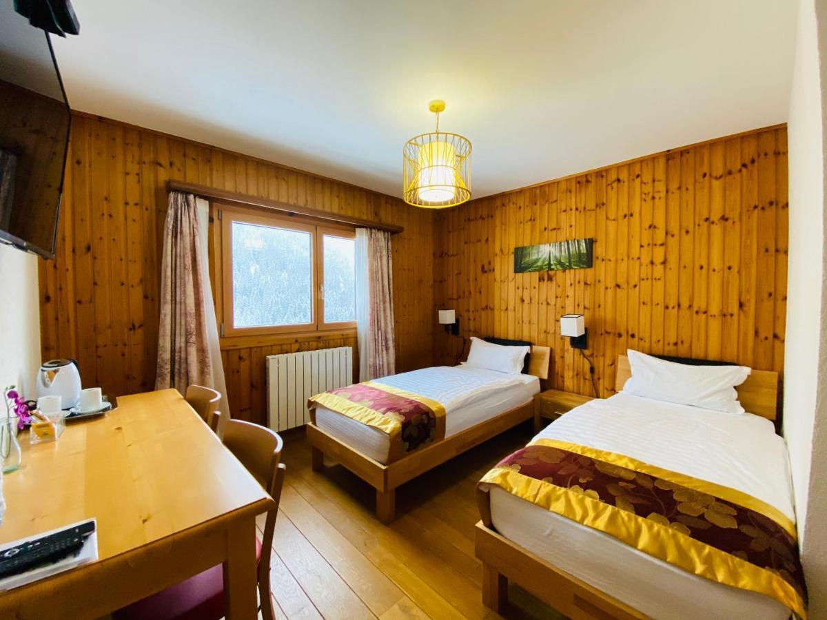 Qi-Lin Hotel Restaurant Ayer Екстериор снимка