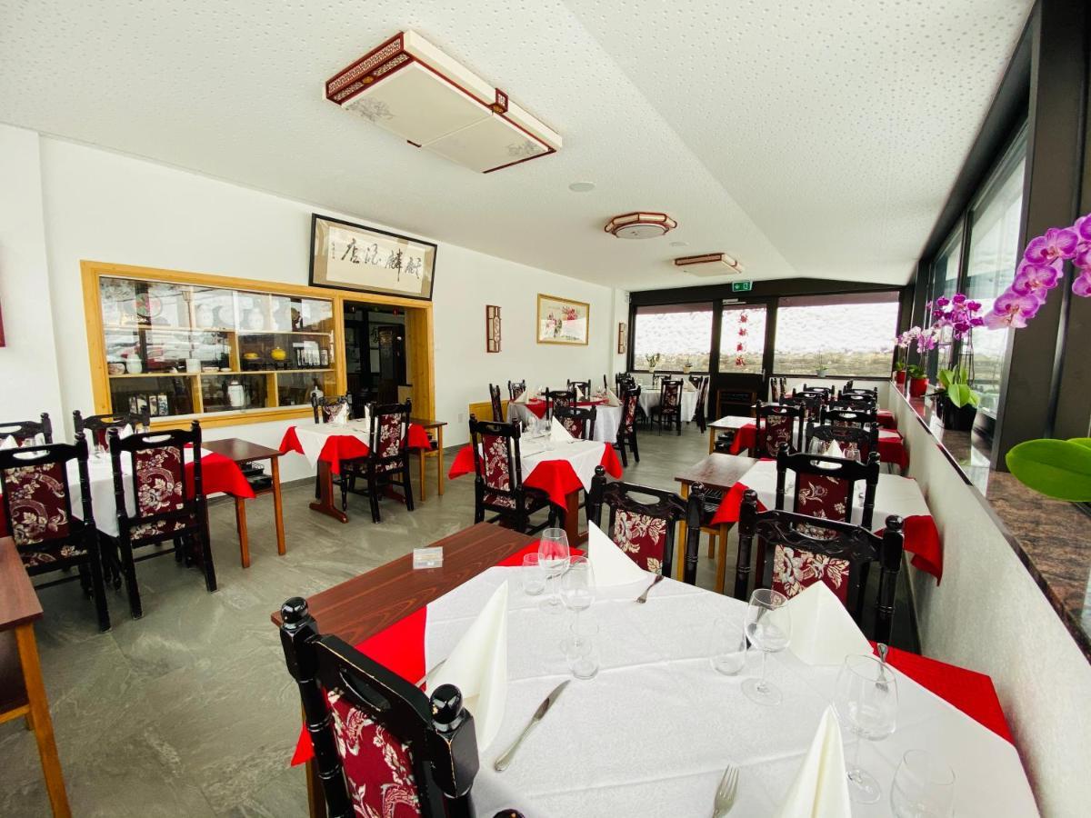Qi-Lin Hotel Restaurant Ayer Екстериор снимка