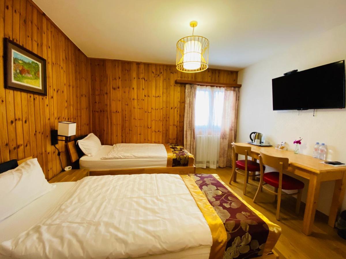 Qi-Lin Hotel Restaurant Ayer Екстериор снимка
